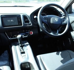 Honda HR-V, interior front drivers side view, steering wheel and center consul