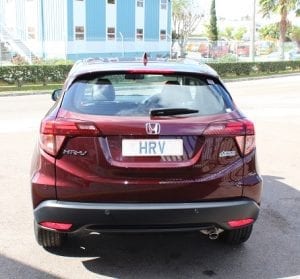 Honda HR-V, rear view, red color, out front of auto solutions showroom